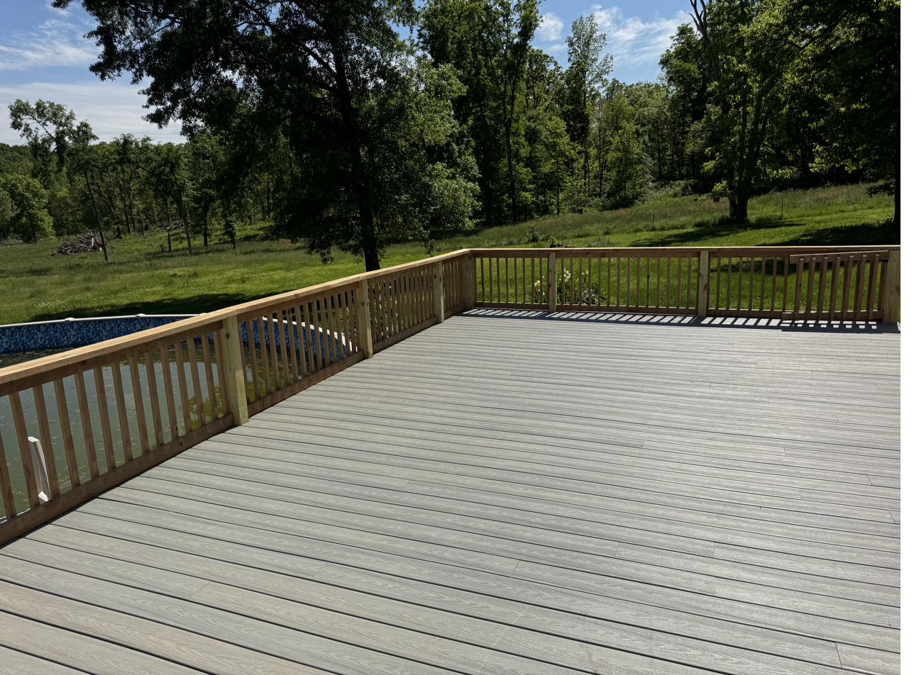 Custom deck construction overlooking Missouri countryside by Cheyenne Valley Construction