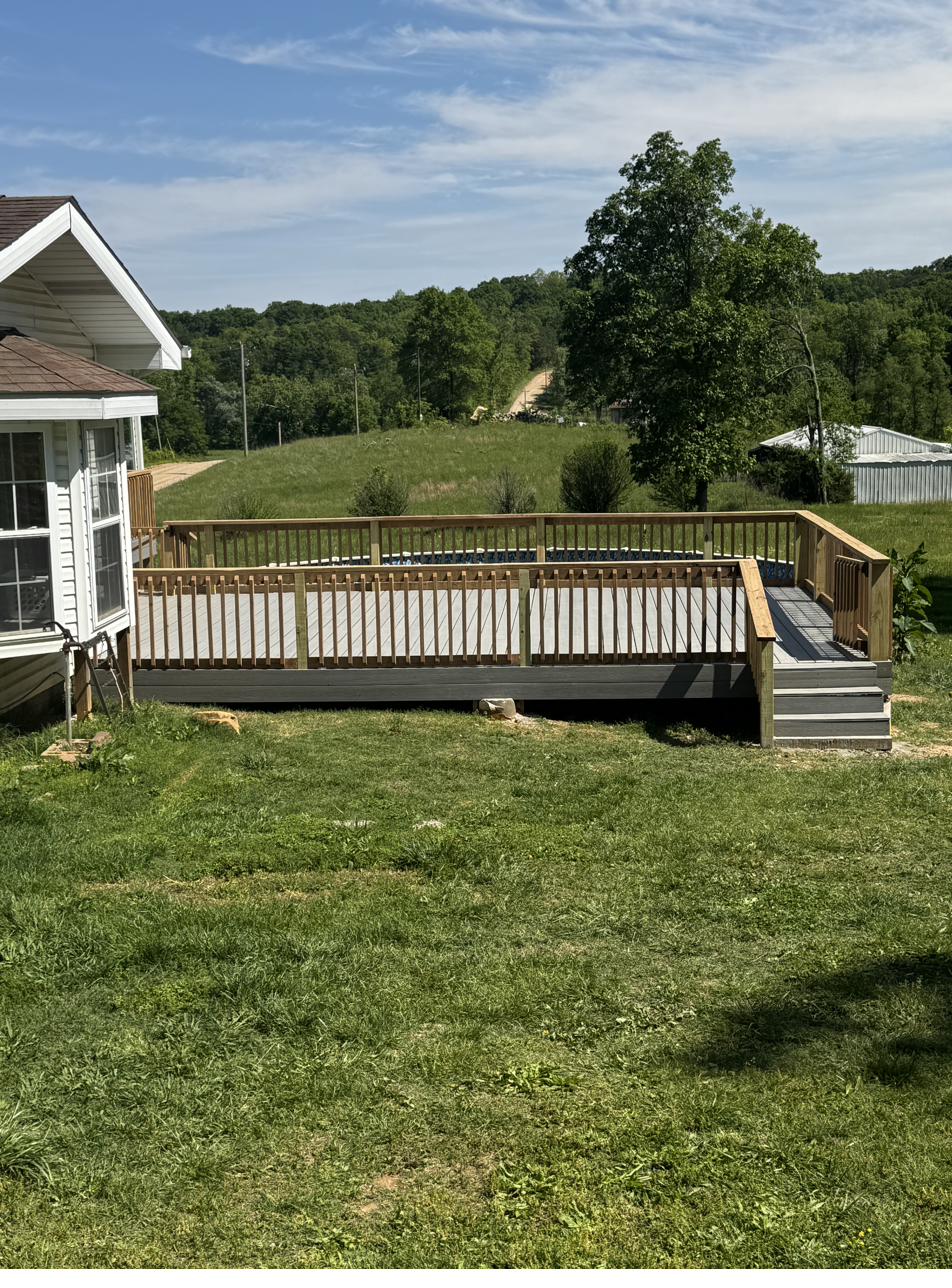 Completed deck construction with Missouri countryside backdrop — Cheyenne Valley Construction